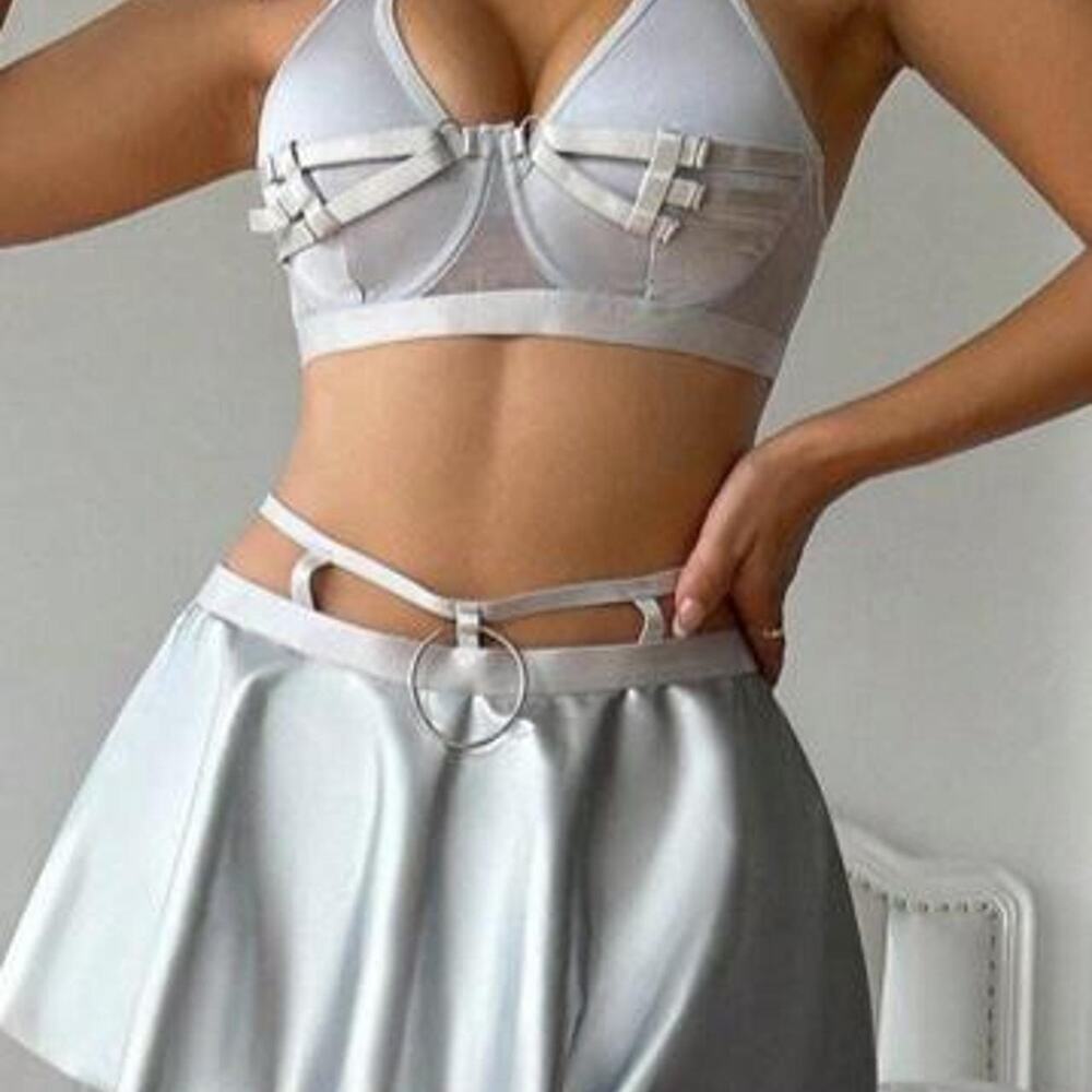 Silver metallic mini skirt and matching top.